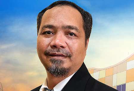   Dr. Rachmat Setyawan, Corporate Division Head of People and Organization Development, PT. Gunanusa Eramandiri Tbk | Agri Business Review 